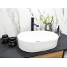 Elegancka umywalka ceramiczna nablatowa Desna 50x35 – biała owalna świetność